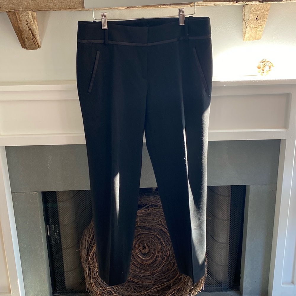 Black tuxedo style dress pants.